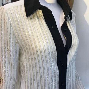 Super cute Dallin Chase sparky button up tee. Size small.